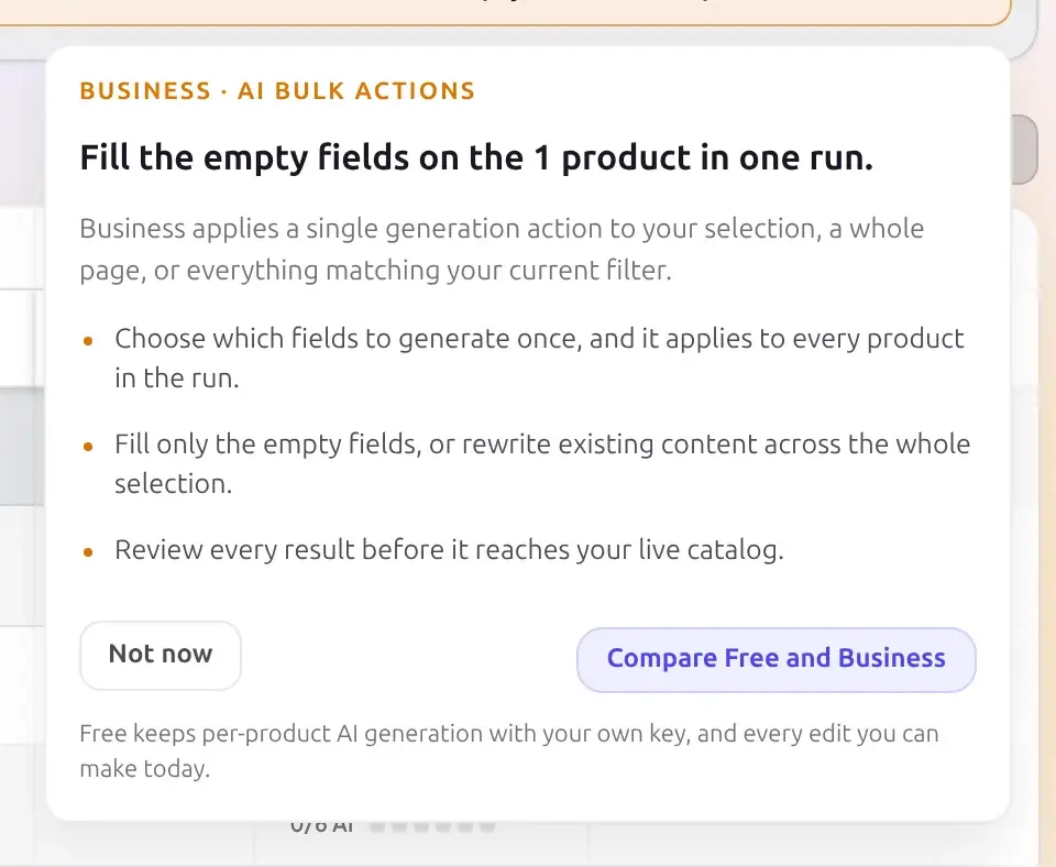 Popover reading Business applies a single generation action to your selection, a whole page, or everything matching your current filter, with 3 bullets and a Compare Free and Business button